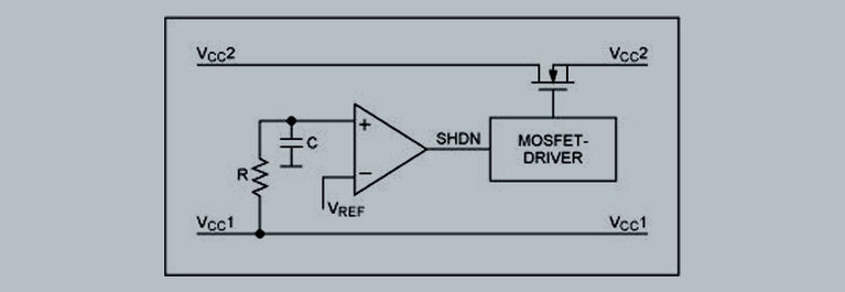 Power sequencing using an RC network, comparator and MOSFET driver